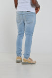 Andrews Apparel Distressed Skinny Jeans in Fade-Away Sky Blue